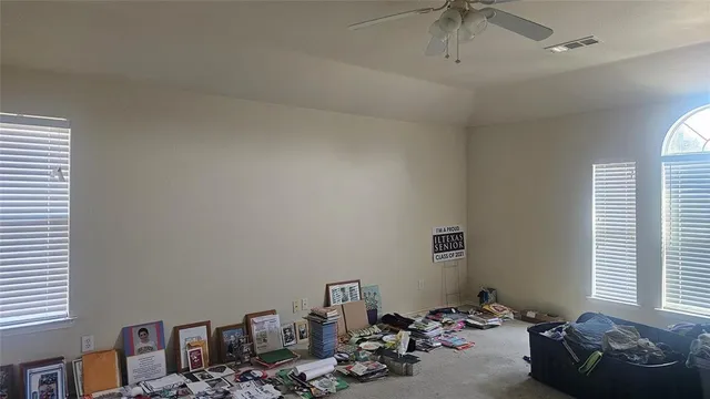 a room with a baby bed baby crib and a dresser