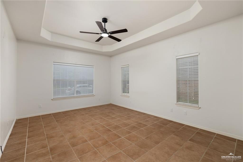 1311 East 28th Street Mission, TX 78574 - Photo 11 of 19 a view of an empty room with a window