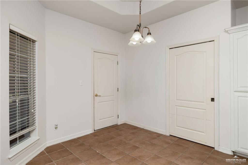 1311 East 28th Street Mission, TX 78574 - Photo 9 of 19 a view of a chandelier fan and entryway