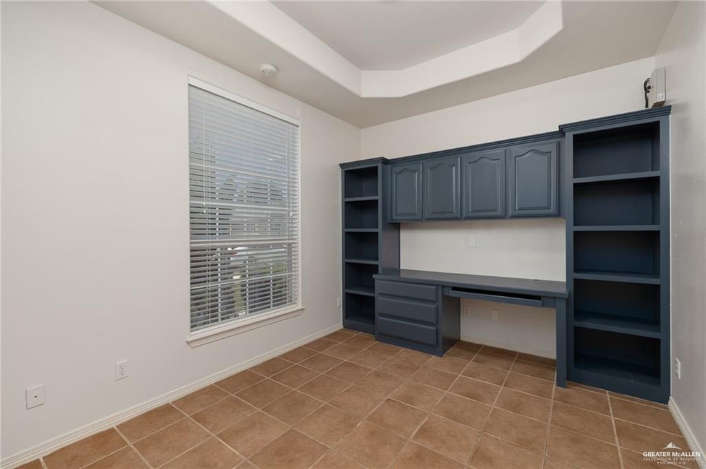1311 East 28th Street Mission, TX 78574 - Photo 10 of 19 a room with a furniture and a window