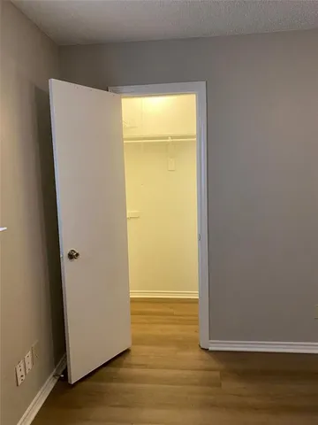 a close up view of walk in closet