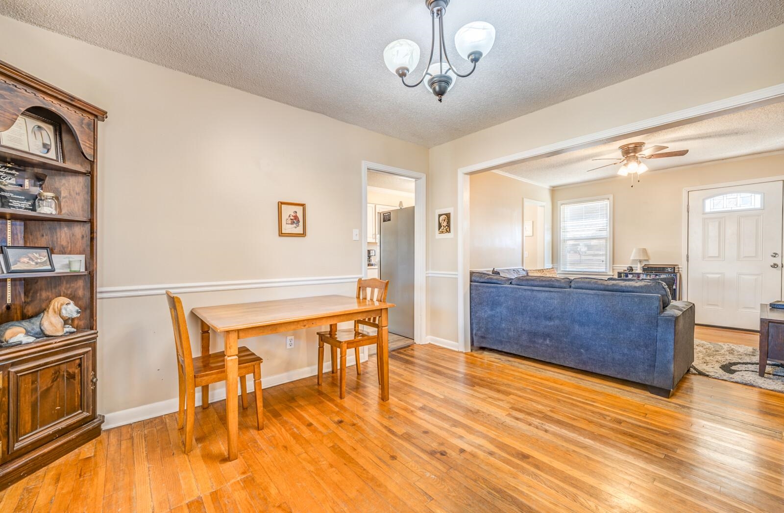 11060 Memphis Arlington Road Arlington, TN 38002 - Photo 11 of 25 a view of a dining room with furniture and wooden floor