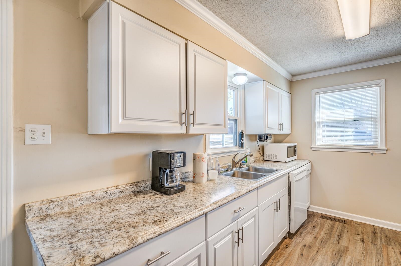11060 Memphis Arlington Road Arlington, TN 38002 - Photo 5 of 25 a kitchen with sink cabinets and window