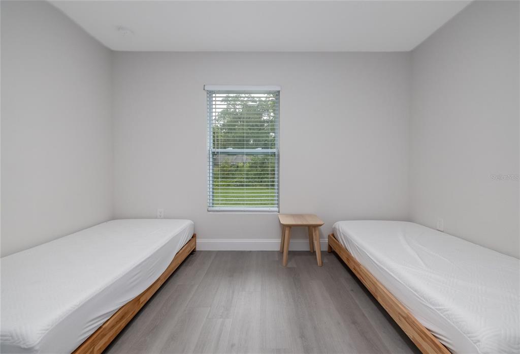 1171 9th Street Orange City, FL 32763 - Photo 18 of 27 a bathroom with a sink and a bathtub