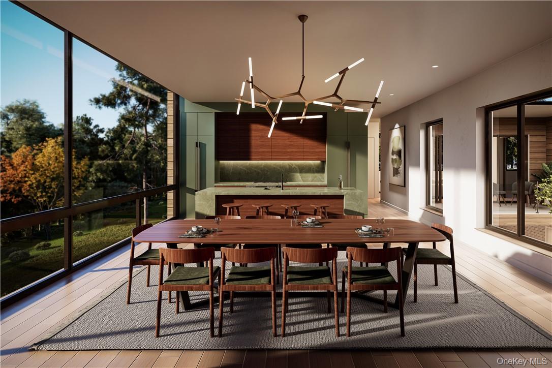 Lift House Bulls Head Road Clinton Corners, NY 12514 - Photo 5 of 16 Dining area open to the kitchen, anchored by a fireplace and with amazing walls of windows.