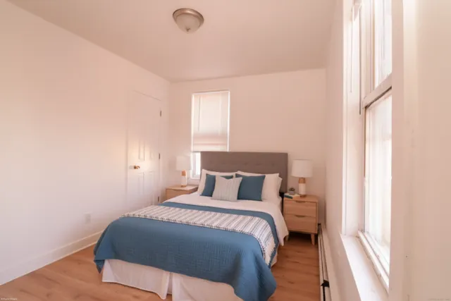 a bathroom with a shower and a sink