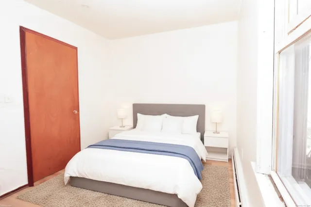 a kitchen with stainless steel appliances granite countertop a refrigerator sink and cabinets