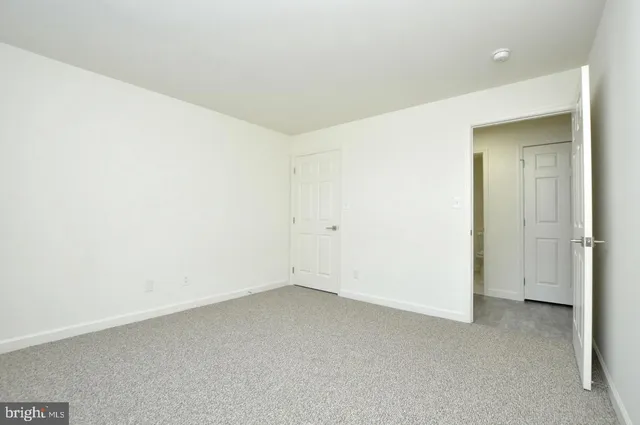 an empty room with a workbench