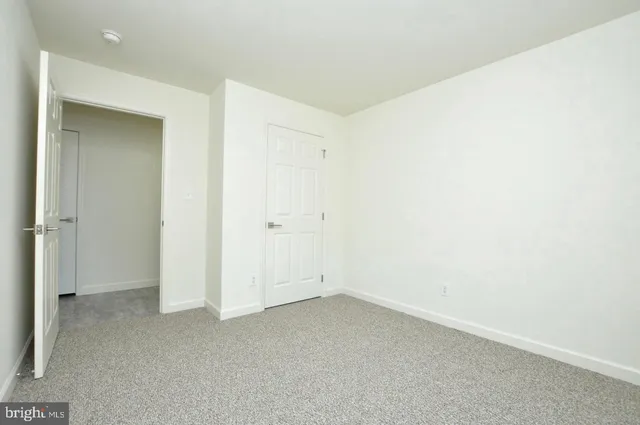 an empty room with an entryway