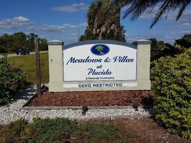 a sign that is on the side of a building