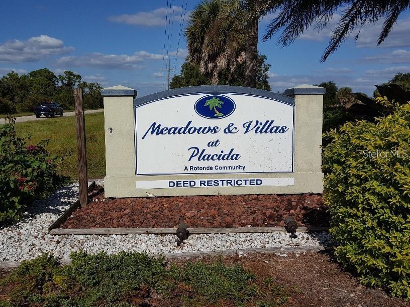 16 Ash Lane Placida, FL 33946 - Photo 3 of 5 a sign that is on the side of a building