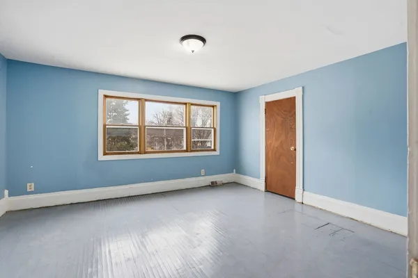 an empty room with windows