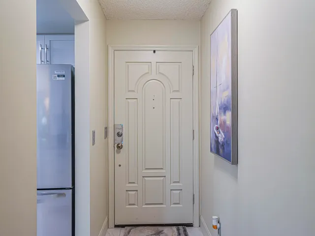 a view of a park with large trees