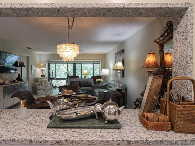 a kitchen with a refrigerator sink and microwave