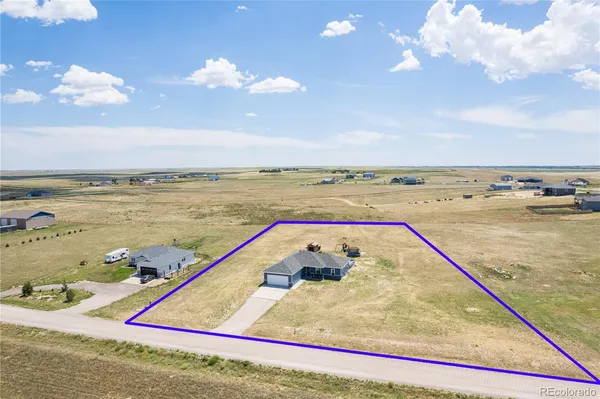 $518,000 | 7566 County Road, Wiggins, CO 80654