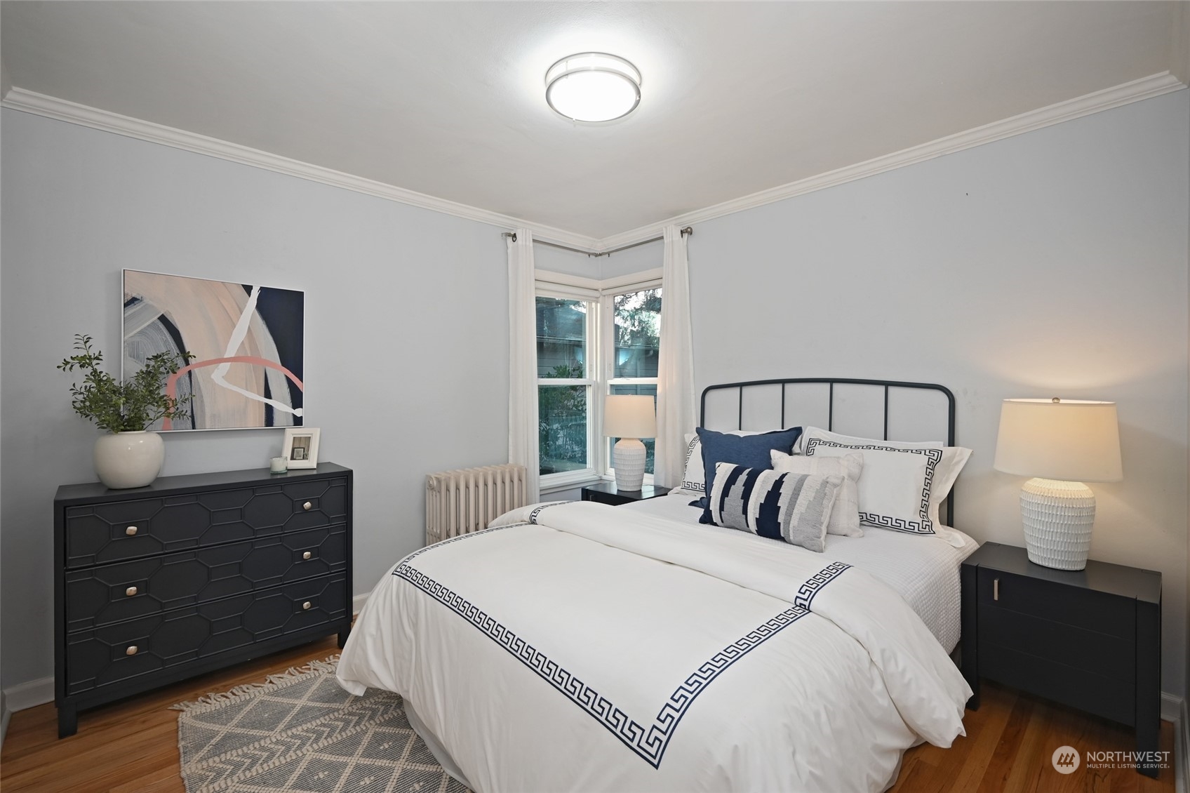 312 Northeast 95th Street Seattle, WA 98115 - Photo 15 of 37 a bedroom with a bed and a closet