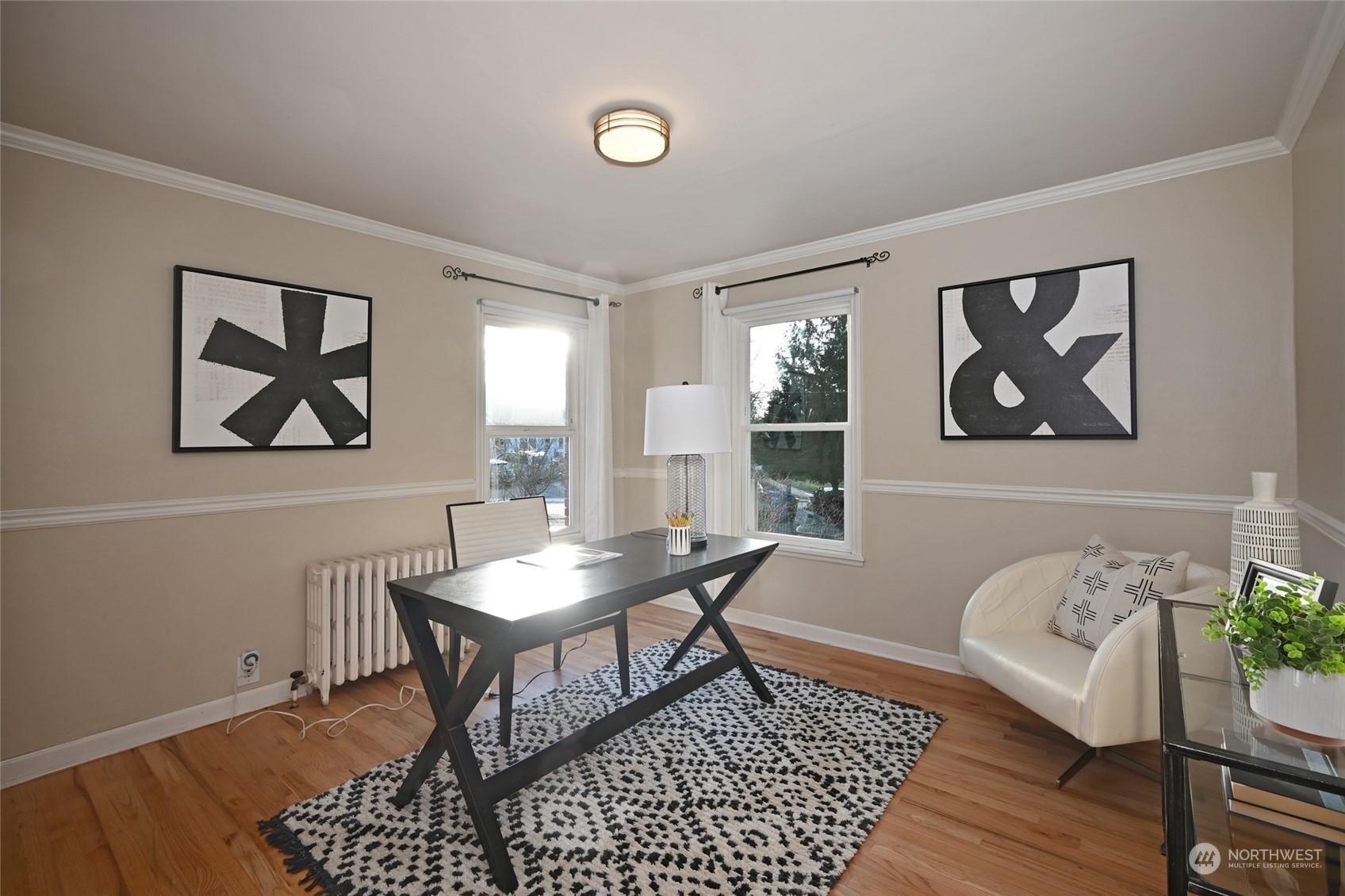 312 Northeast 95th Street Seattle, WA 98115 - Photo 16 of 37 a living room with furniture and a painting on the wall