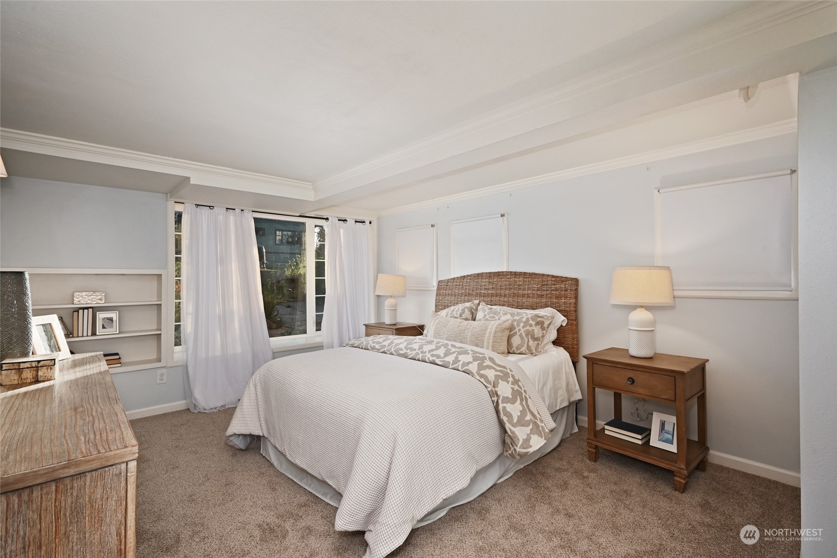 312 Northeast 95th Street Seattle, WA 98115 - Photo 21 of 37 a bedroom with a bed and a cabinets