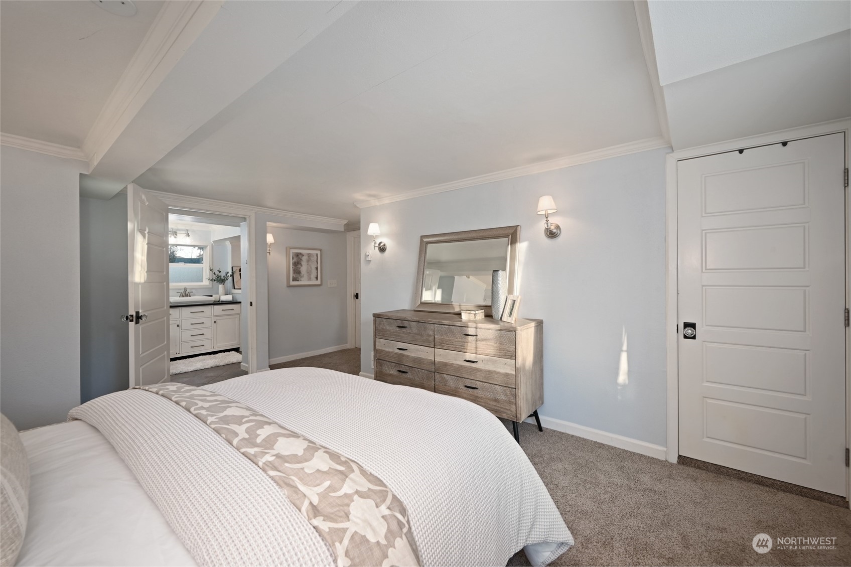 312 Northeast 95th Street Seattle, WA 98115 - Photo 23 of 37 a bedroom with a bed and a dresser