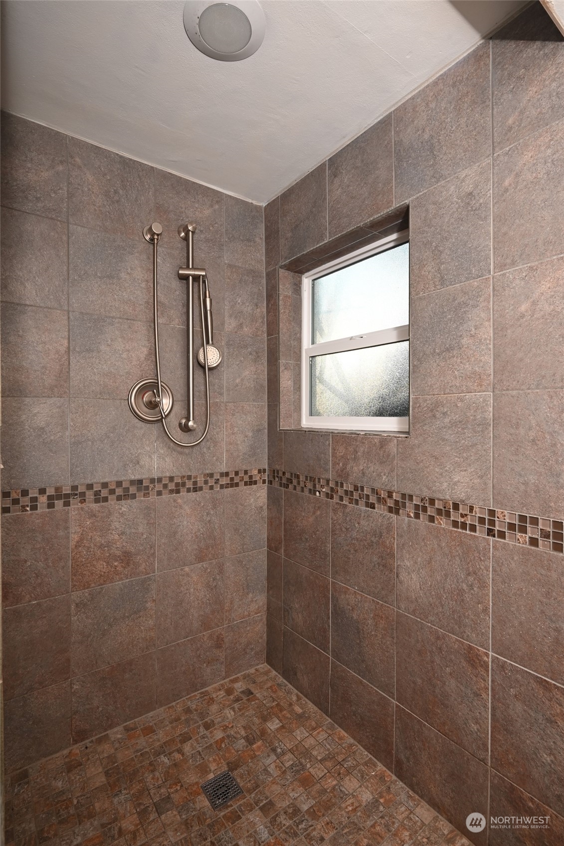 312 Northeast 95th Street Seattle, WA 98115 - Photo 26 of 37 a bathroom with a shower