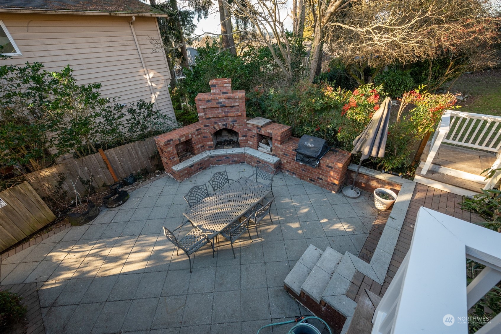312 Northeast 95th Street Seattle, WA 98115 - Photo 5 of 37 a view of a backyard with sitting area and furniture