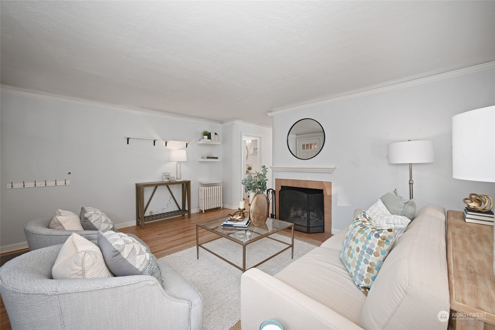 312 Northeast 95th Street Seattle, WA 98115 - Photo 9 of 37 a living room with furniture a fireplace and window