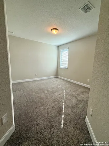 a bathroom with a double vanity sink toilet and shower