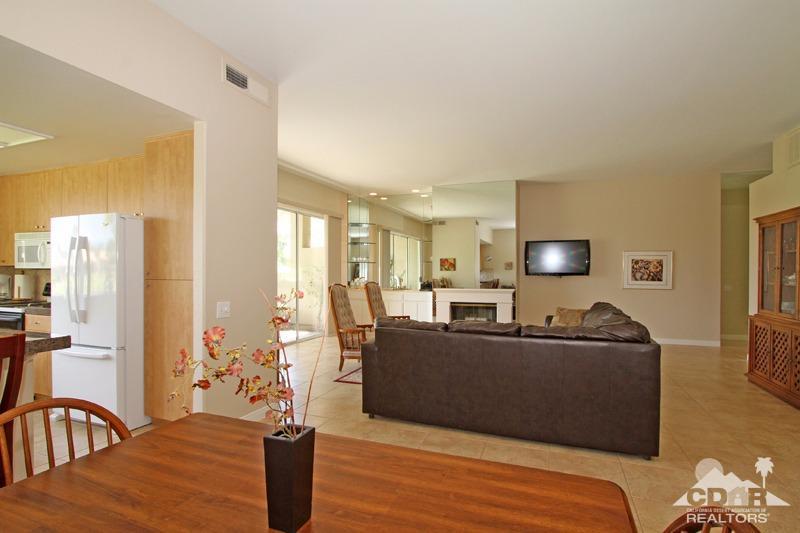 56 Oak Tree Drive Rancho Mirage, CA 92270 - Photo 12 of 32 a living room with furniture and a flat screen tv