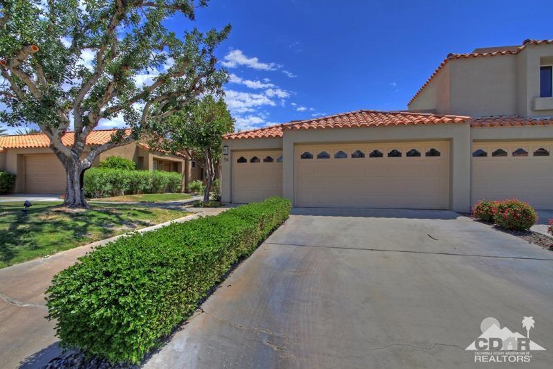 56 Oak Tree Drive Rancho Mirage, CA 92270 - Photo 26 of 32 a view of a house with a yard