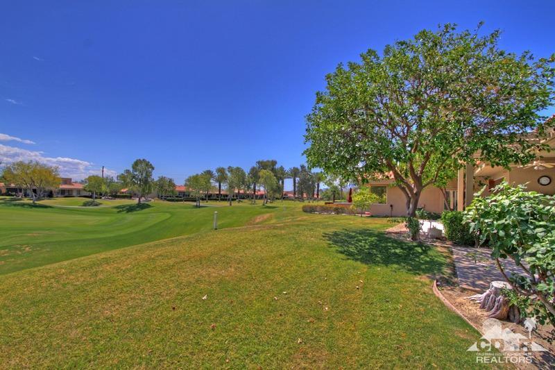56 Oak Tree Drive Rancho Mirage, CA 92270 - Photo 28 of 32 a view of field with tree in the background