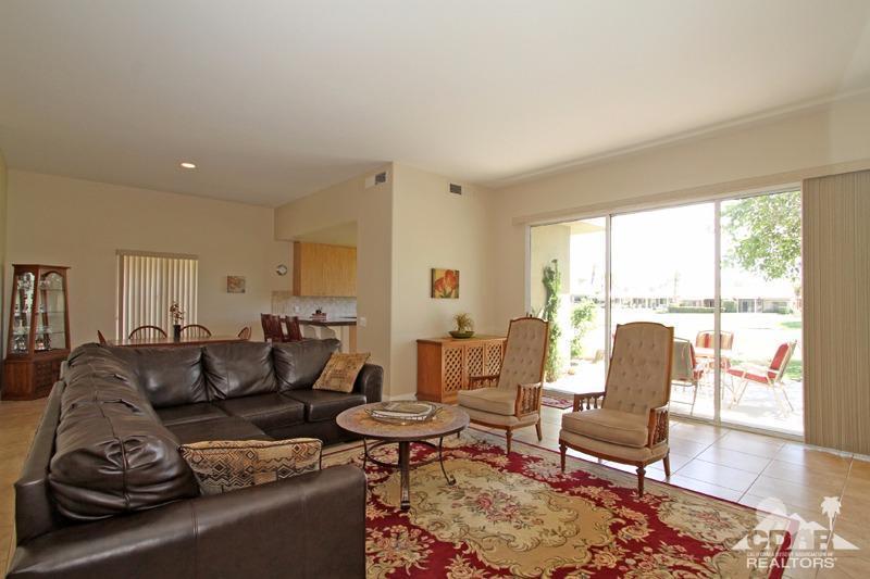 56 Oak Tree Drive Rancho Mirage, CA 92270 - Photo 6 of 32 a living room with furniture and a large window