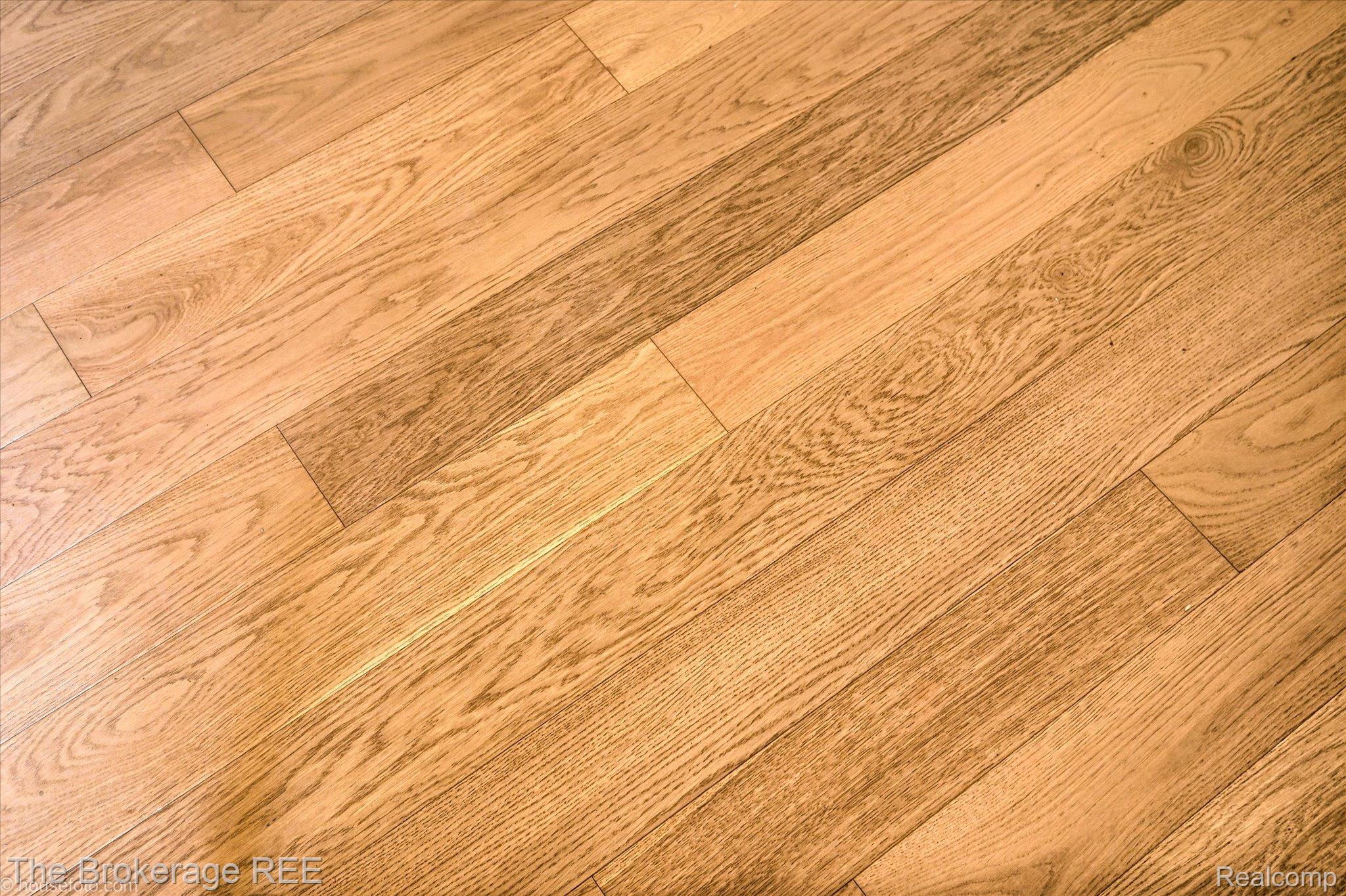 1077 Hadley Road Lapeer, MI 48446 - Photo 33 of 61 Wood-finish flooring planks showcasing natural grain patterns