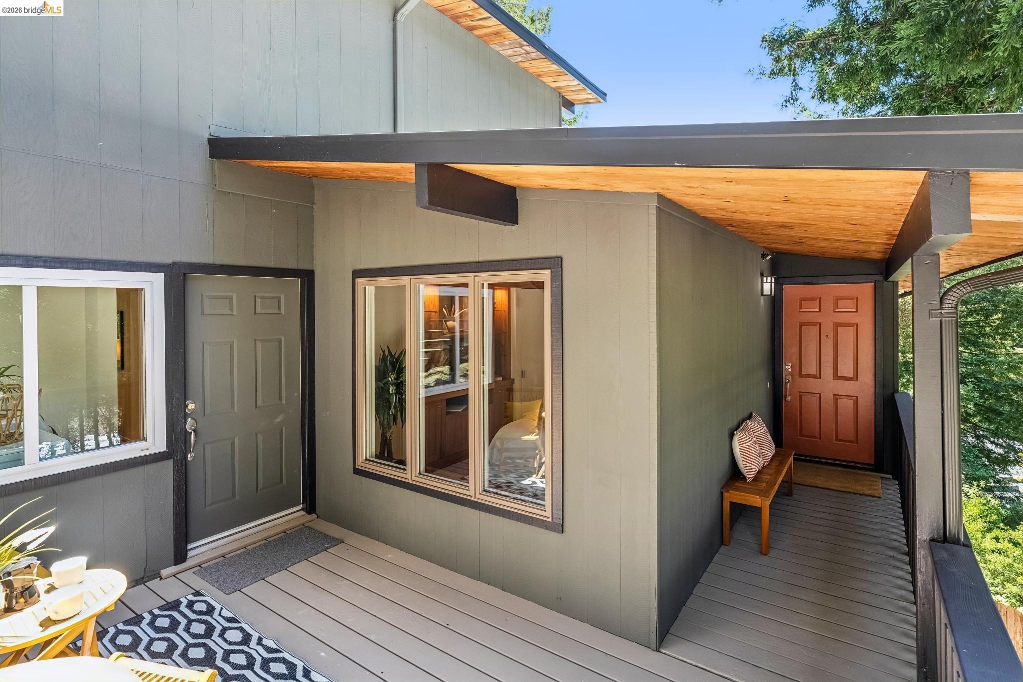 6645 Heather Ridge Way Oakland, CA 94611 - Photo 11 of 61 Exterior siding featuring a modern gray finish and contrasting dark trim