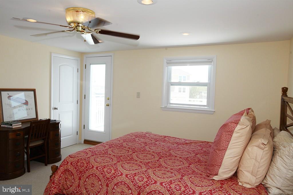 45 Alma Road Long Beach Township, NJ 08006 - Photo 19 of 29 a bedroom with a bed and a window
