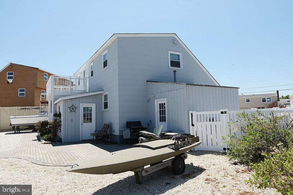 45 Alma Road Long Beach Township, NJ 08006 - Photo 20 of 29 a view of a house with backyard and furniture