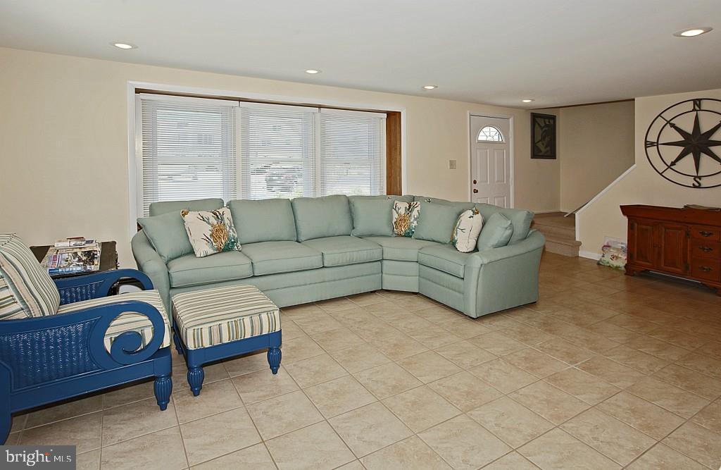 45 Alma Road Long Beach Township, NJ 08006 - Photo 7 of 29 a living room with furniture and a window