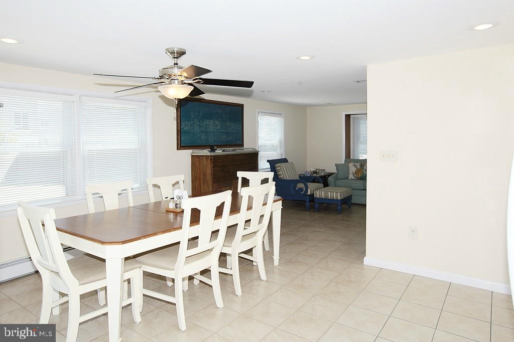 45 Alma Road Long Beach Township, NJ 08006 - Photo 9 of 29 a dining room with furniture and window