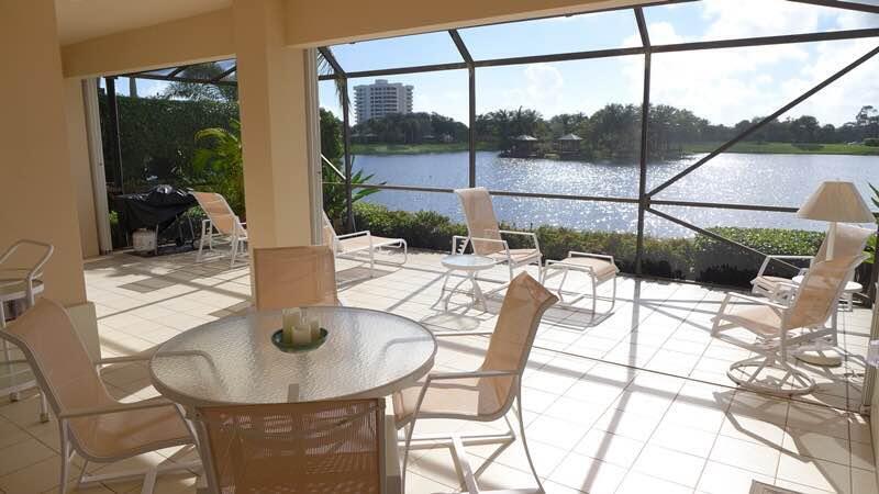 3446 Southern Cay Drive Jupiter, FL 33477 - Photo 12 of 15 a view of a dining room with furniture wooden floor and a table
