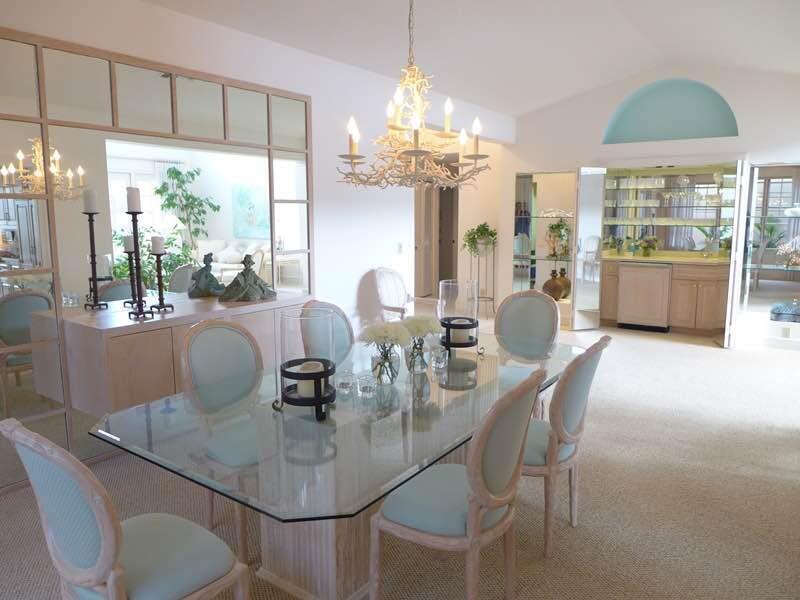 3446 Southern Cay Drive Jupiter, FL 33477 - Photo 5 of 15 a dining room with furniture a chandelier and window
