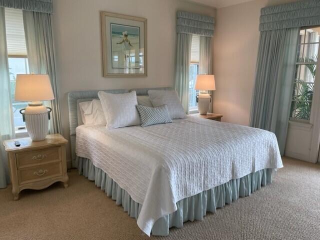 3446 Southern Cay Drive Jupiter, FL 33477 - Photo 6 of 15 a bedroom with a bed and a window