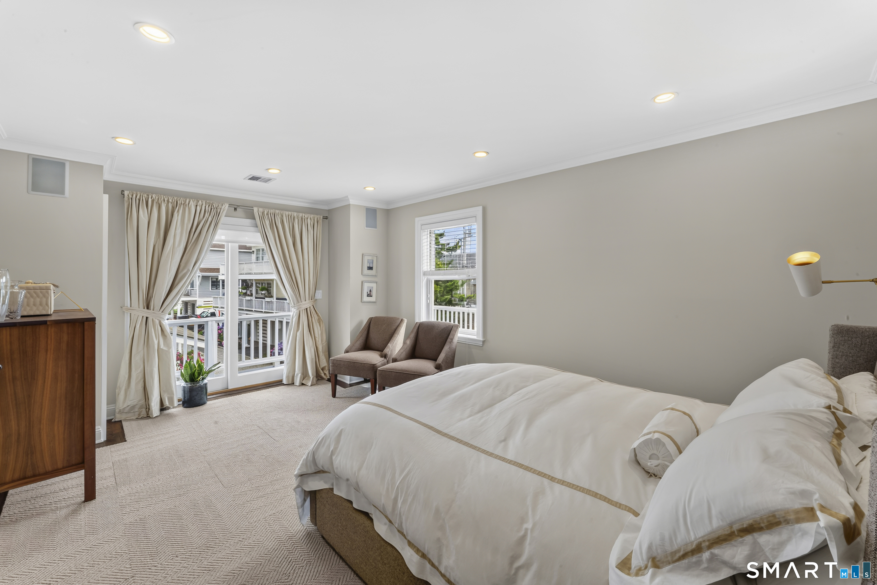 679 Fairfield Beach Road, Unit 679 Fairfield, CT 06824 - Photo 17 of 38 Primary Suite with walkout to deck and water views.