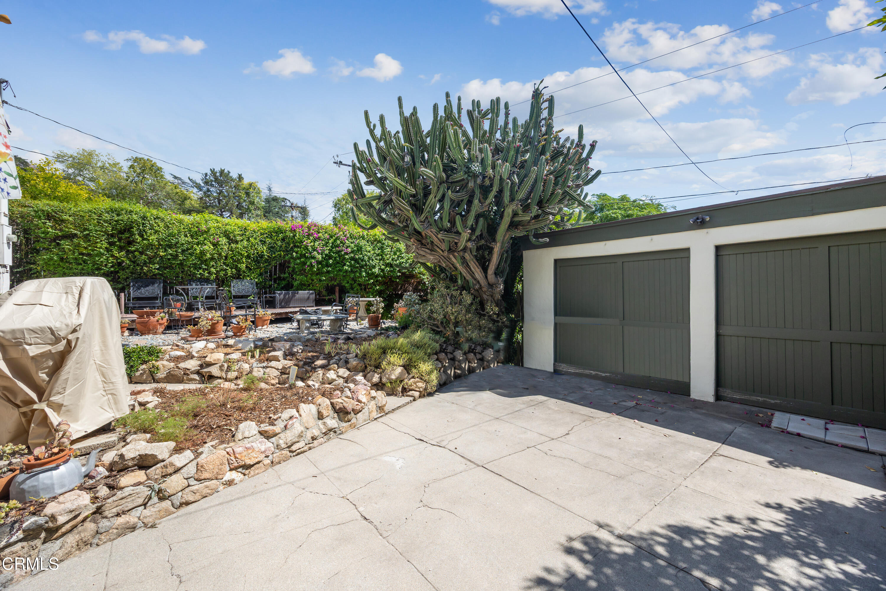974 Athens Street Altadena, CA 91001 - Photo 22 of 24 a view of backyard with plants and trees