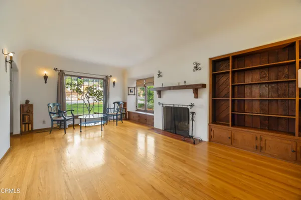 a view of a livingroom with furniture and a fireplace