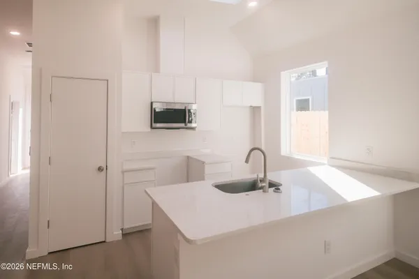 a close view of a sink and a vanity in the bathroom