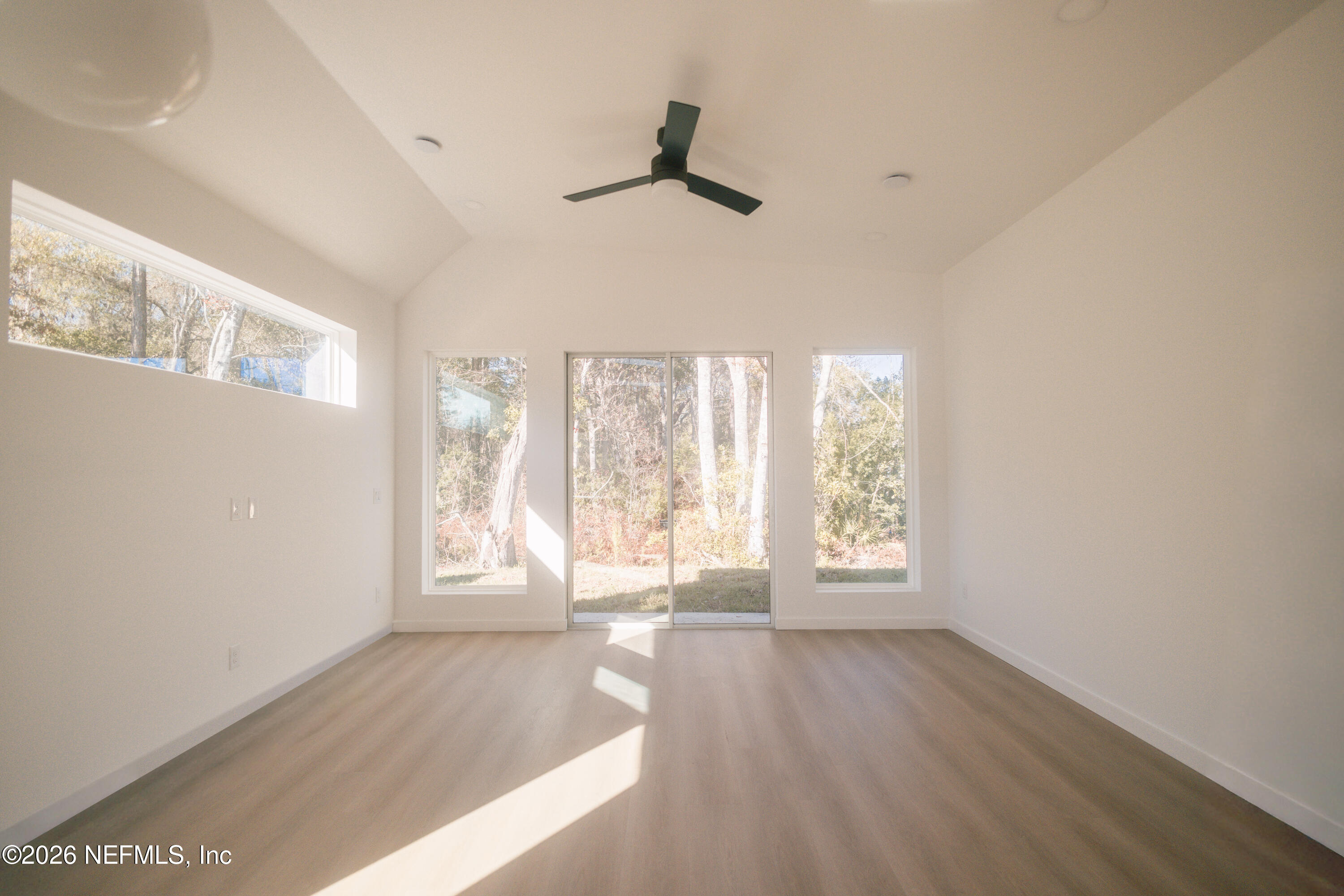 572 Woodlawn Road St. Augustine, FL 32084 - Photo 9 of 15 a view of an empty room with a window
