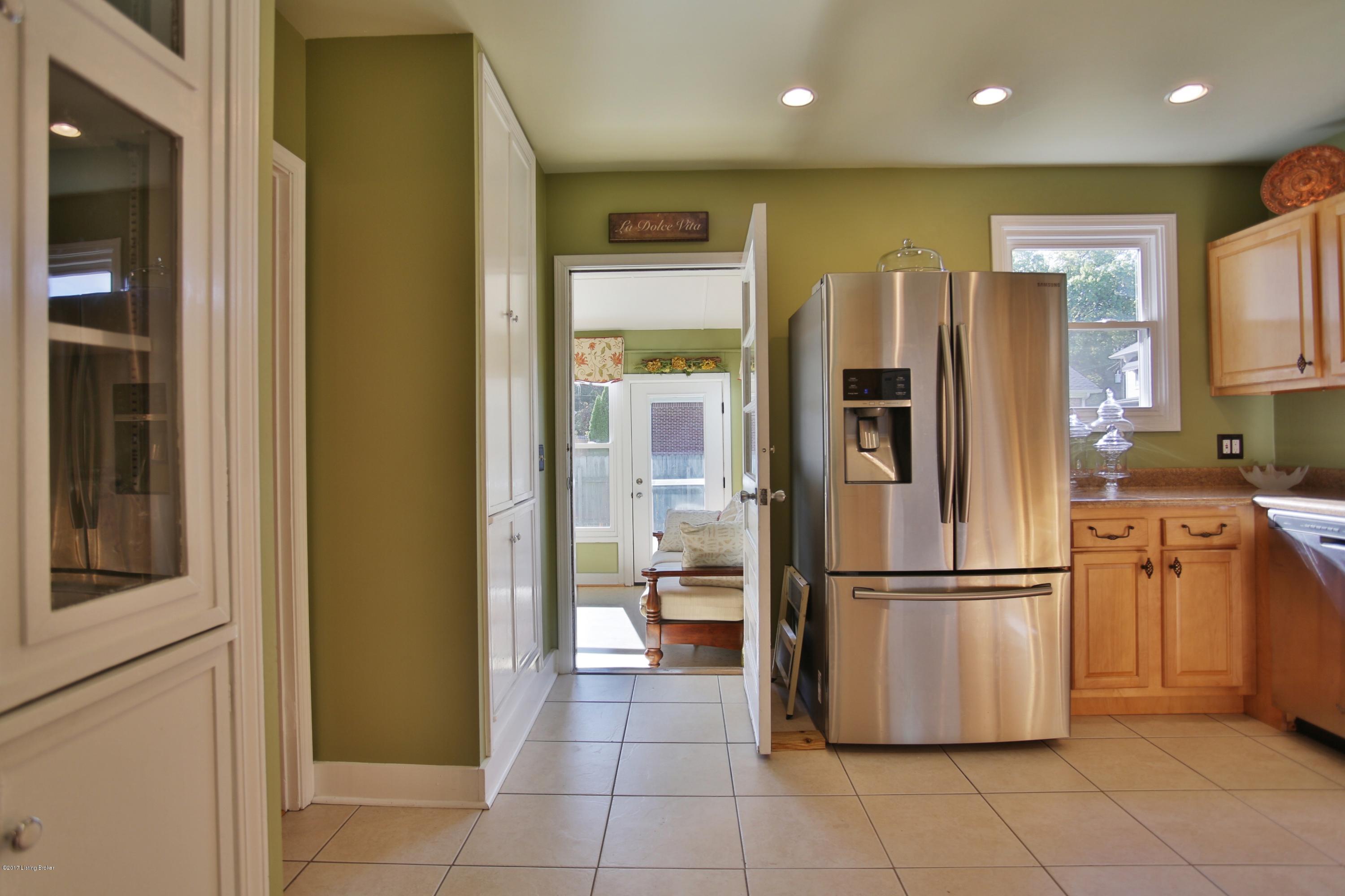 426 Wood Road Louisville, KY 40222 - Photo 25 of 38 Kitchen flows with ease between dining and sun room.