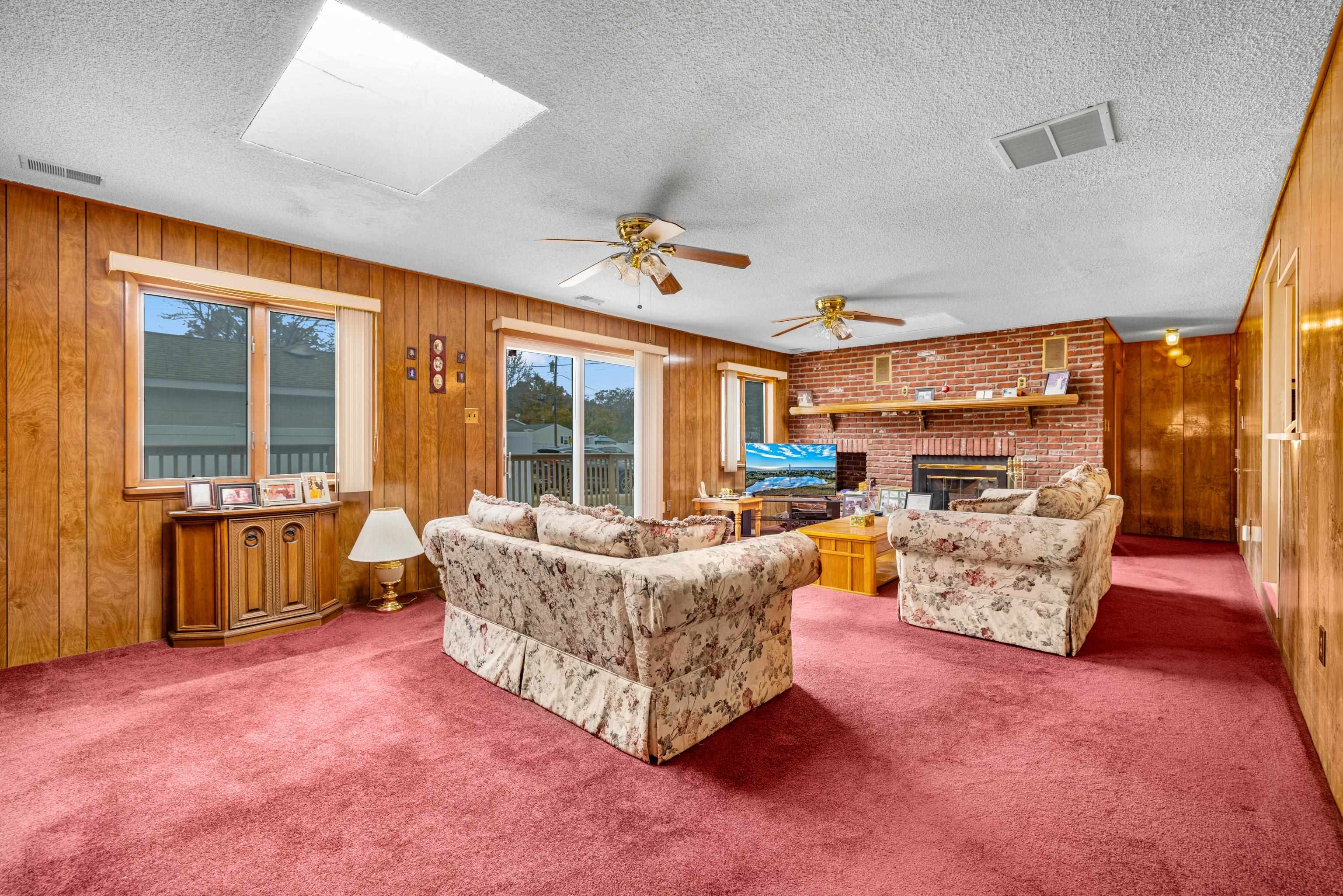 315 East Drumbed Road Villas, NJ 08251 - Photo 20 of 32 a living room with furniture and a fireplace