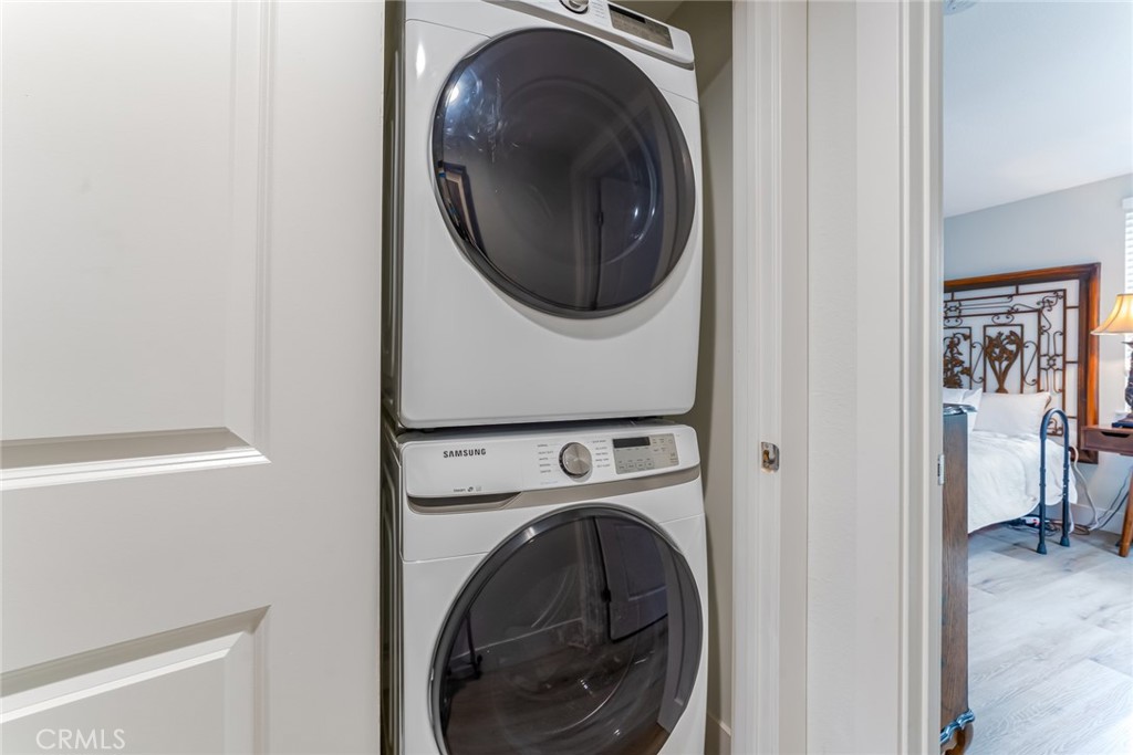 74 Calle Aragon, Unit B Laguna Woods, CA 92637 - Photo 21 of 22 a utility room with dryer and washer