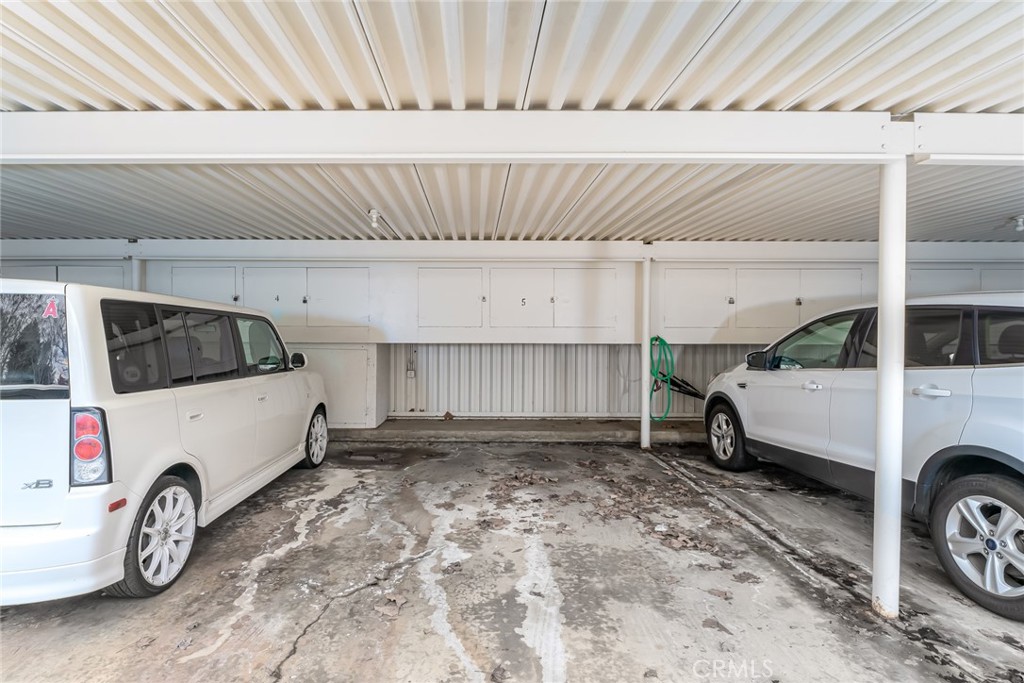 74 Calle Aragon, Unit B Laguna Woods, CA 92637 - Photo 22 of 22 a view of a car garage