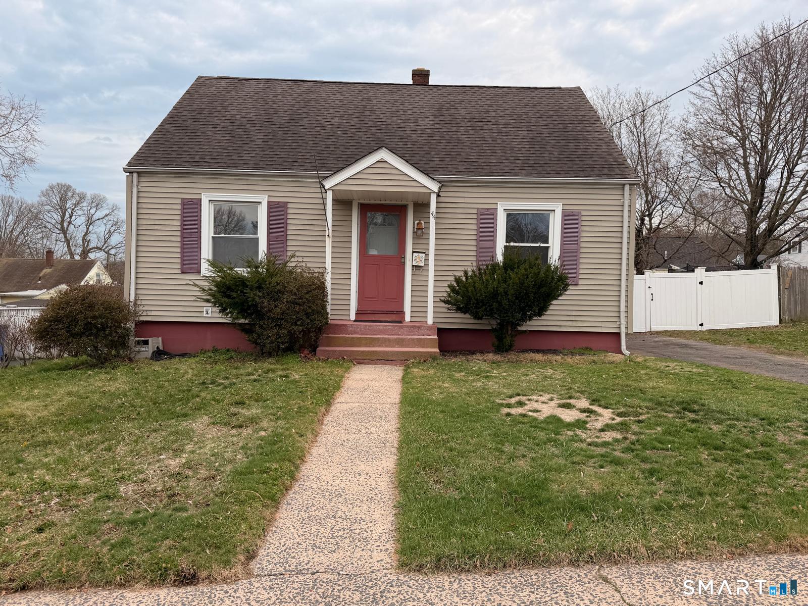 44 Lynmoor Place Hamden, CT 06517 - Photo 2 of 30 a front view of a house with a yard